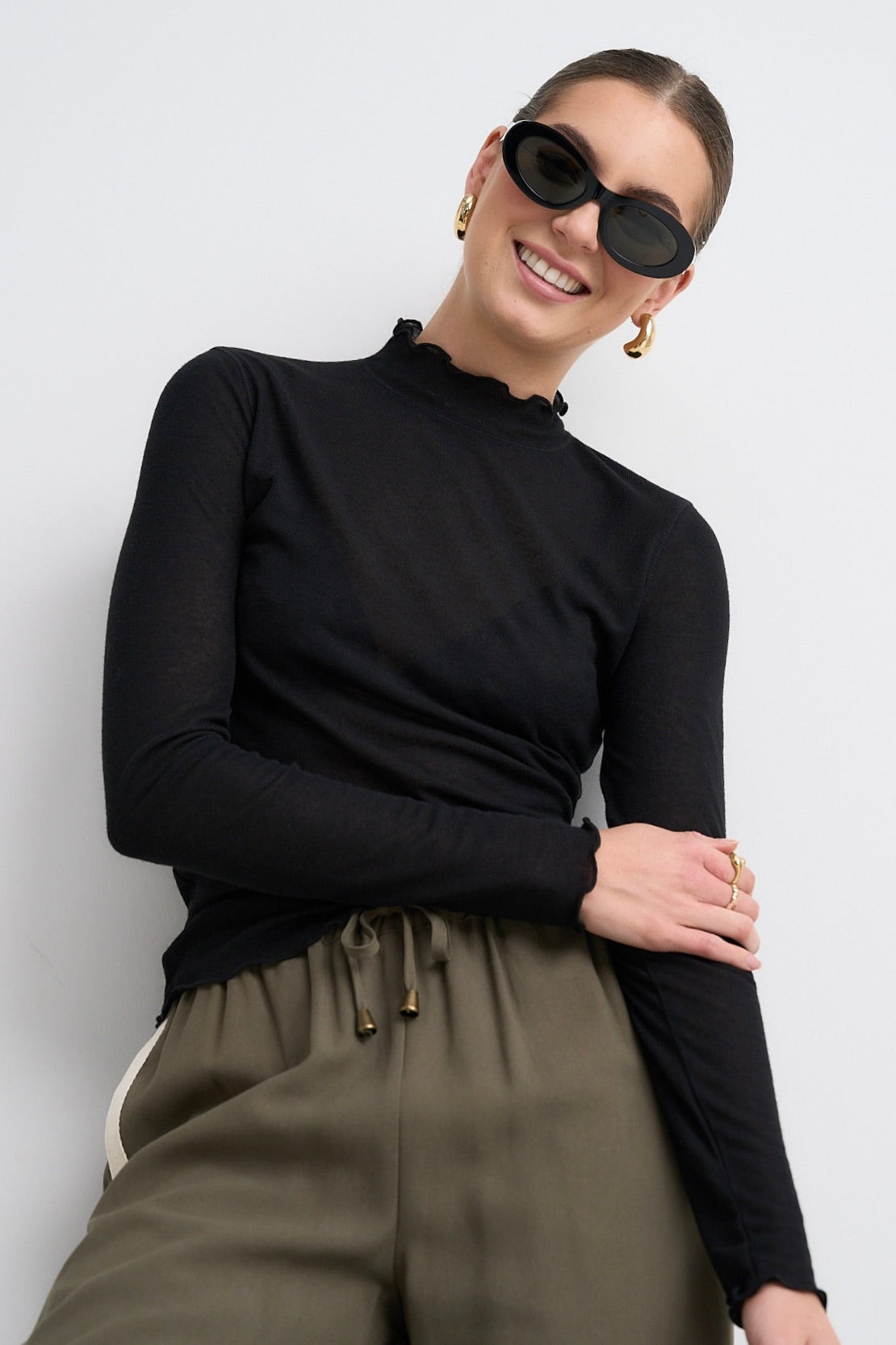 Asher Black Lettuce Edge Knit Top